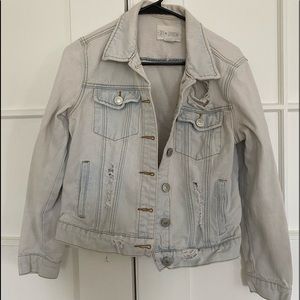Distressed denim jacket